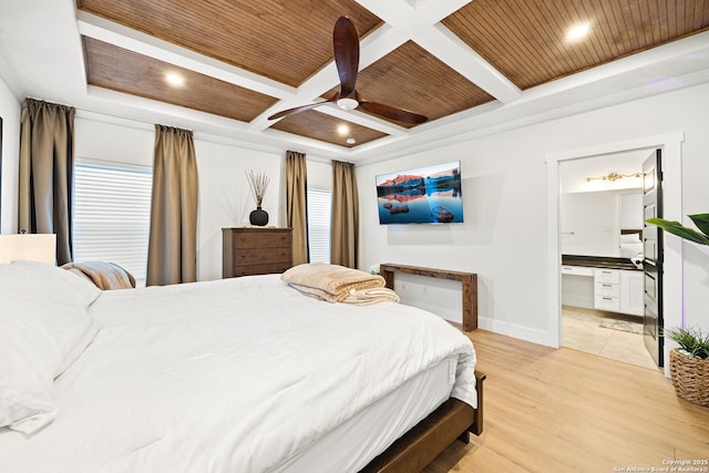 bedroom with wood ceiling, beam ceiling, coffered ceiling, connected bathroom, and light wood-type flooring