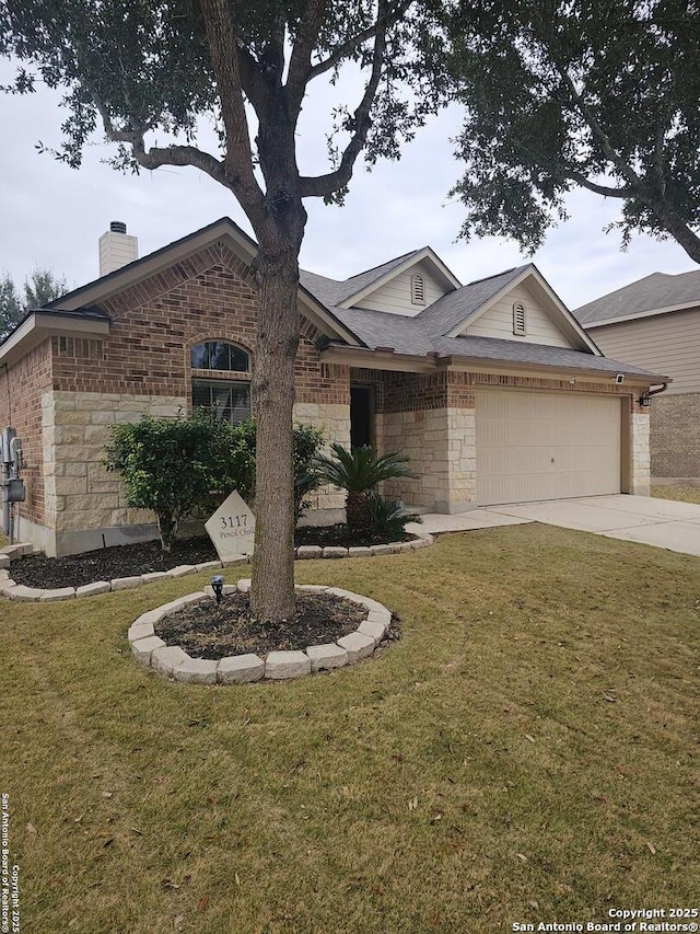 ranch-style house featuring a garage and a front lawn