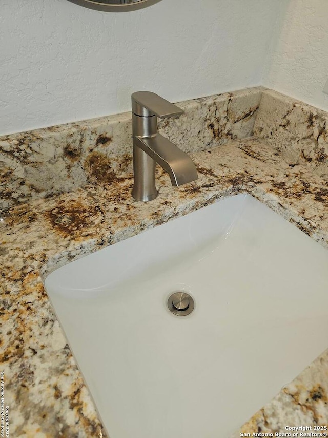 interior details featuring sink