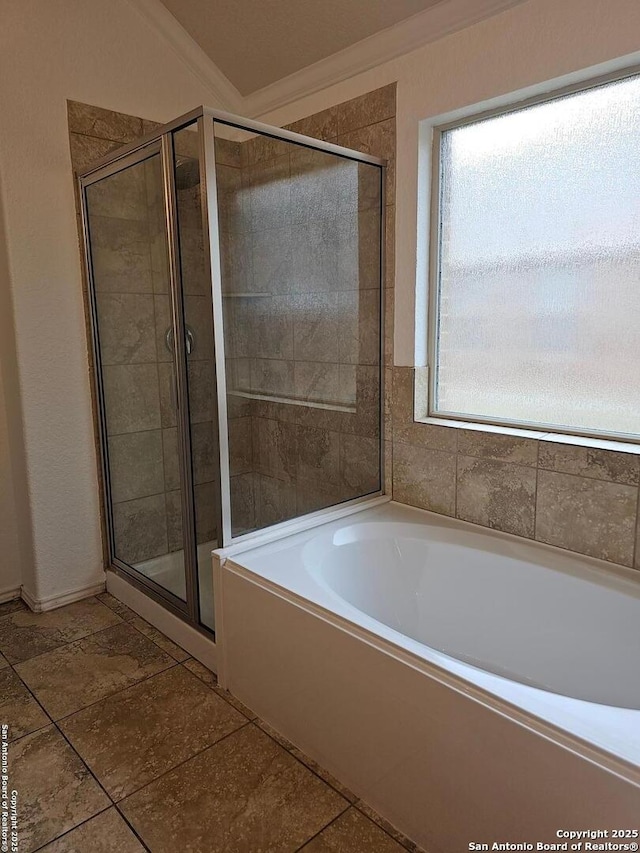 bathroom featuring shower with separate bathtub and crown molding