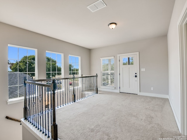 view of carpeted entryway