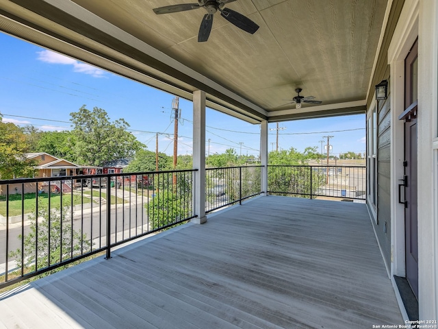 wooden terrace with ceiling fan