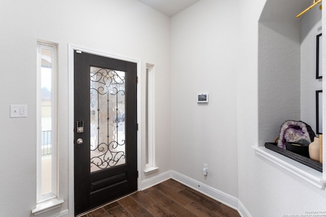 entryway featuring dark wood-type flooring