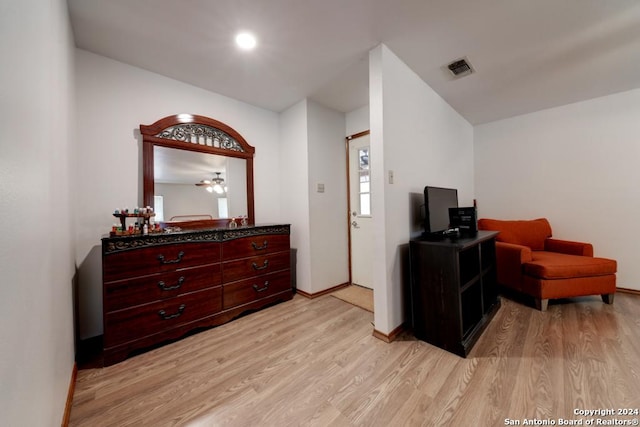 sitting room with light hardwood / wood-style floors