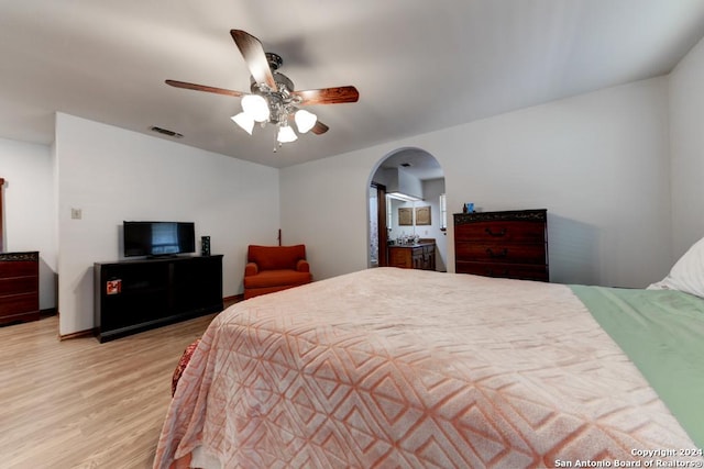 bedroom featuring light hardwood / wood-style floors and ceiling fan