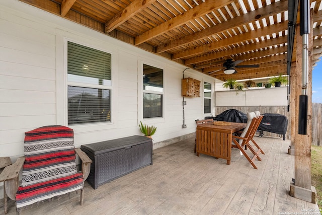 view of patio / terrace featuring ceiling fan and a pergola