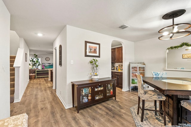 dining area featuring hardwood / wood-style floors