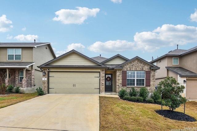 craftsman-style house with a garage and a front yard