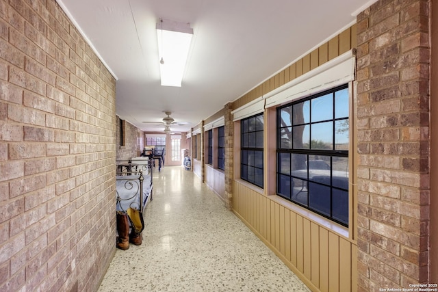 corridor with brick wall