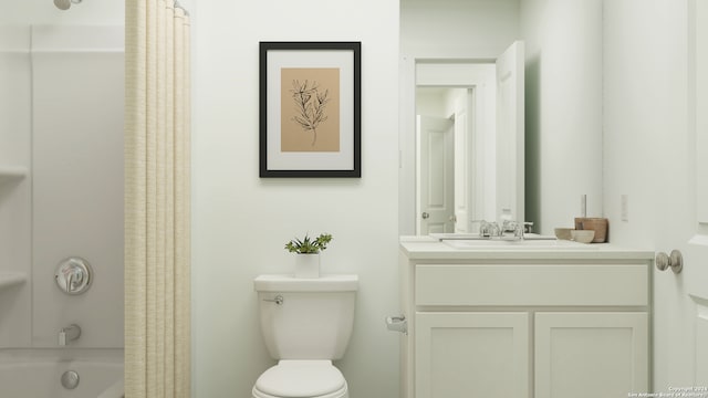 full bathroom featuring shower / bath combo, vanity, and toilet