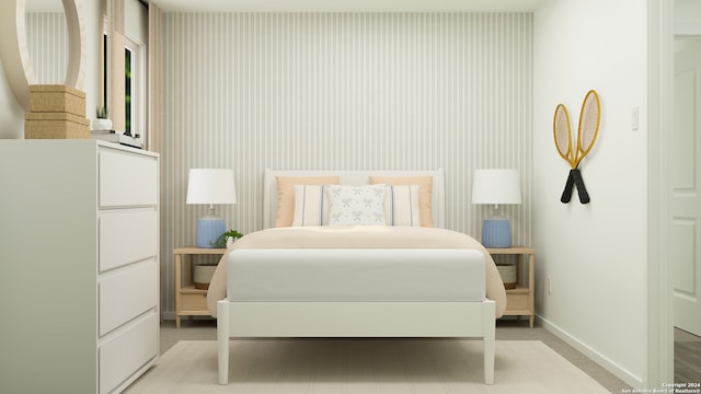 bedroom featuring light colored carpet