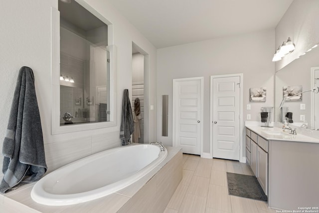 1905 High Bank, Seguin, TX 78155 - full bath with a stall shower, a garden tub, vanity, and tile patterned floors