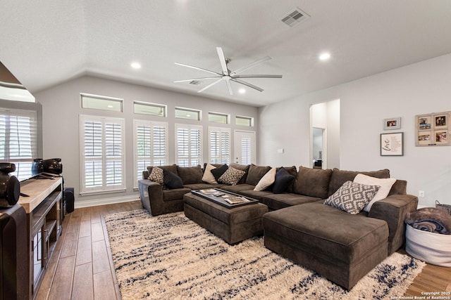 1905 High Bank, Seguin, TX 78155 - living room featuring wood finished floors, a ceiling fan, lofted ceiling, and recessed lighting