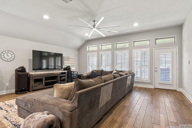 1905 High Bank, Seguin, TX 78155 - living area featuring ceiling fan, baseboards, wood finished floors, plenty of natural light, and recessed lighting