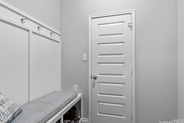 1905 High Bank, Seguin, TX 78155 - mudroom featuring a textured wall