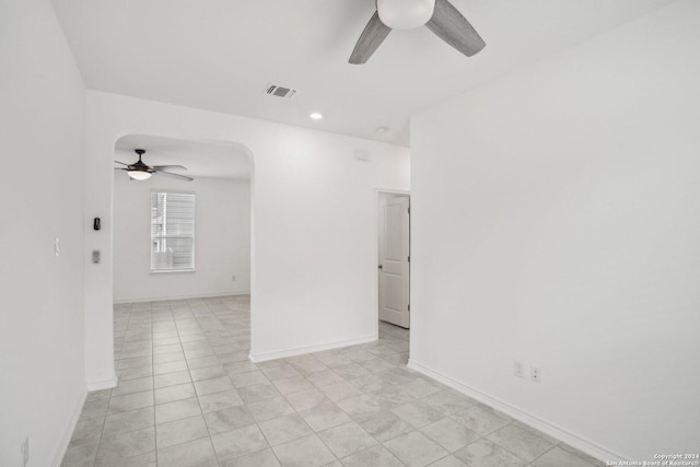 spare room with ceiling fan