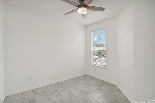 unfurnished room with ceiling fan