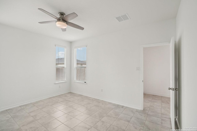 unfurnished room featuring ceiling fan