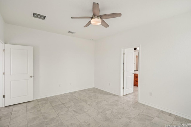 spare room featuring ceiling fan