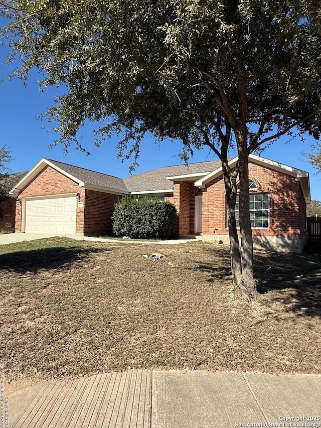 single story home with a garage