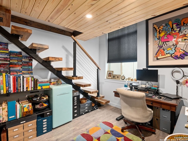 home office with wooden ceiling and light hardwood / wood-style floors