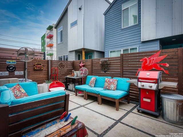 view of patio / terrace featuring an outdoor living space and area for grilling