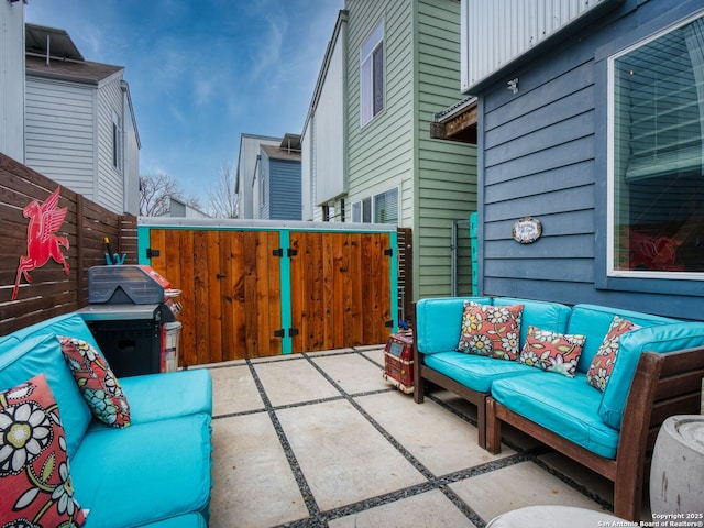 view of patio featuring grilling area and outdoor lounge area