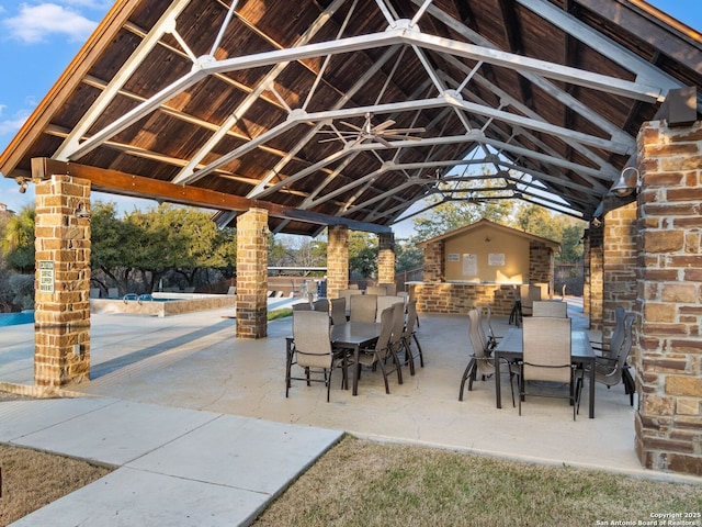 view of patio featuring a gazebo and an outdoor bar