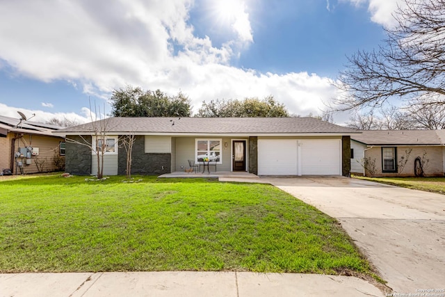 single story home featuring a garage, a front lawn, and covered porch