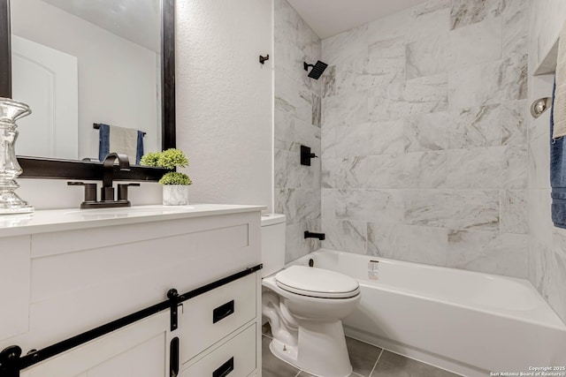 full bathroom featuring vanity, toilet, tile patterned floors, and tiled shower / bath