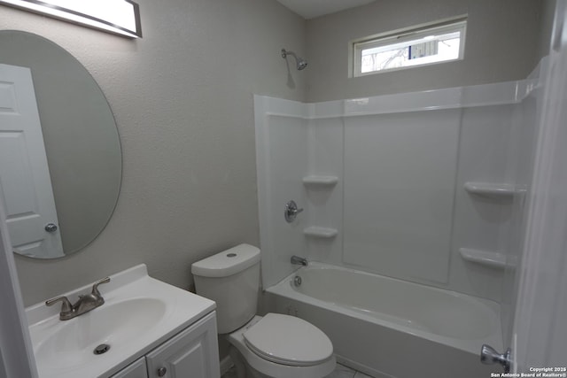 full bathroom featuring shower / tub combination, vanity, and toilet