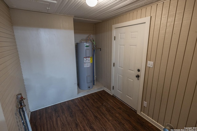 utility room featuring water heater