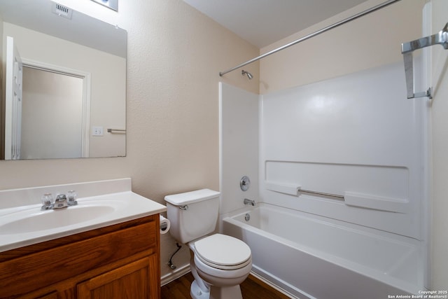 full bathroom featuring vanity, toilet, and tub / shower combination