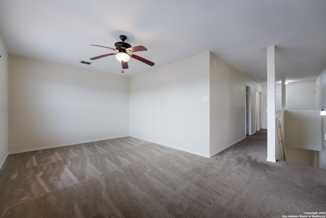 carpeted empty room featuring ceiling fan