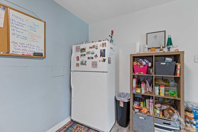 kitchen featuring white refrigerator