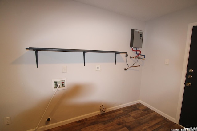 clothes washing area with dark wood-type flooring and washer hookup