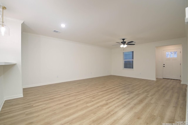 unfurnished living room with crown molding, ceiling fan, and light hardwood / wood-style floors