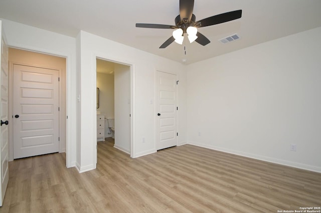 unfurnished bedroom with ceiling fan and light hardwood / wood-style floors