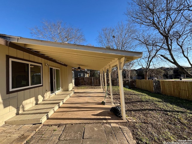 view of patio featuring ceiling fan