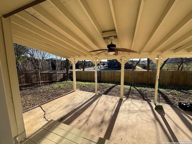 view of patio featuring ceiling fan