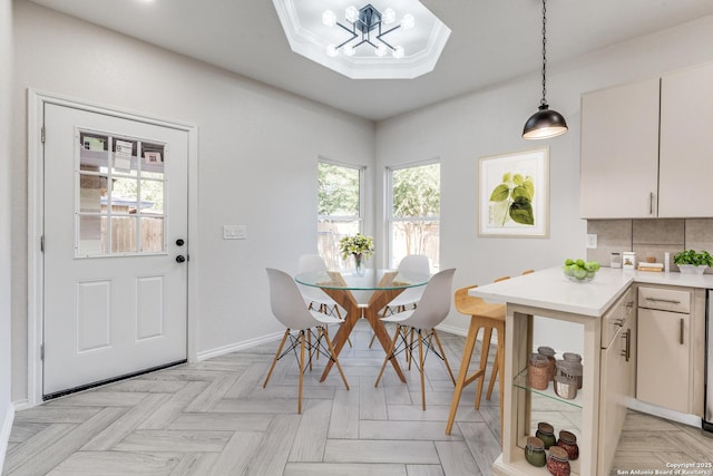 dining area featuring light parquet flooring