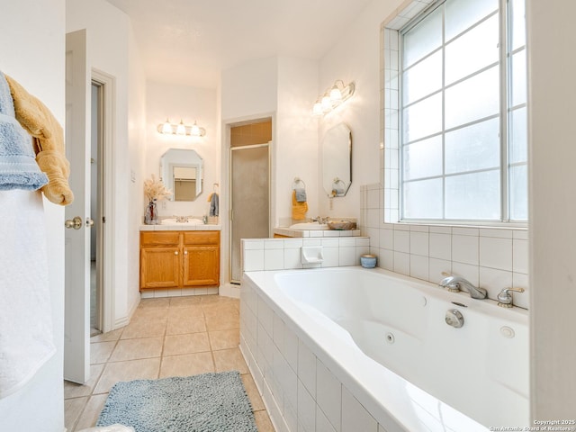 bathroom with vanity, tile patterned floors, and independent shower and bath