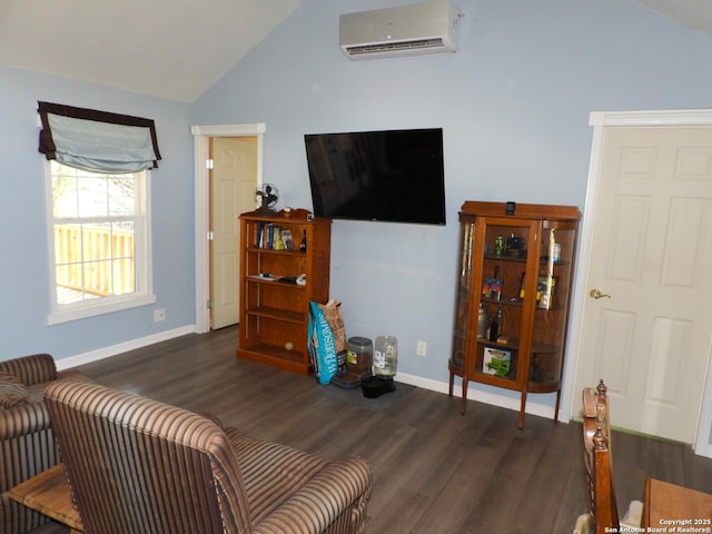 living room with lofted ceiling, dark wood-type flooring, and a wall unit AC