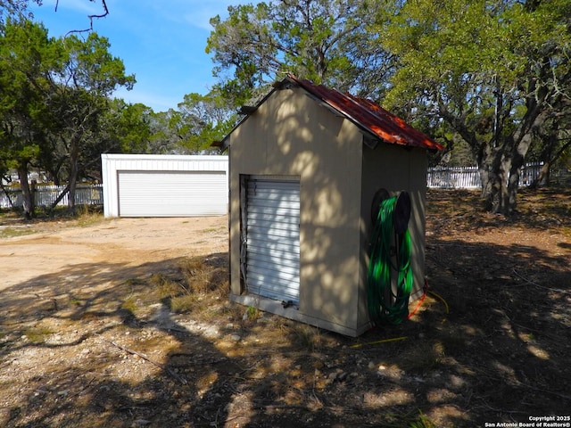 view of outbuilding with a garage