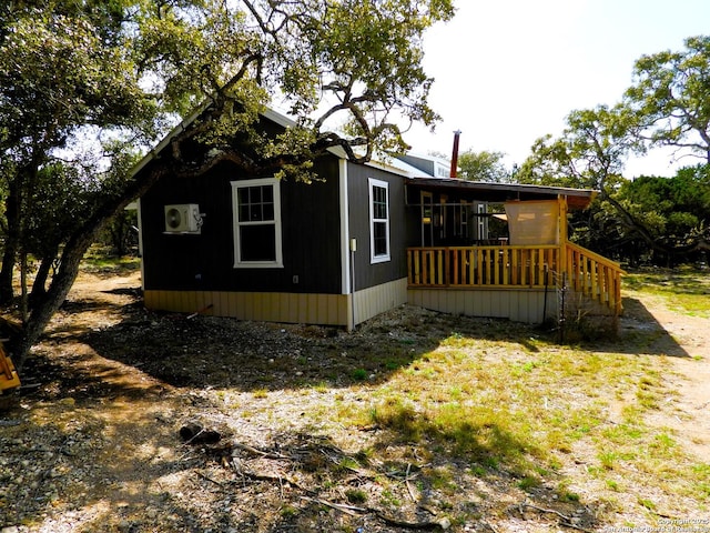 view of home's exterior featuring ac unit