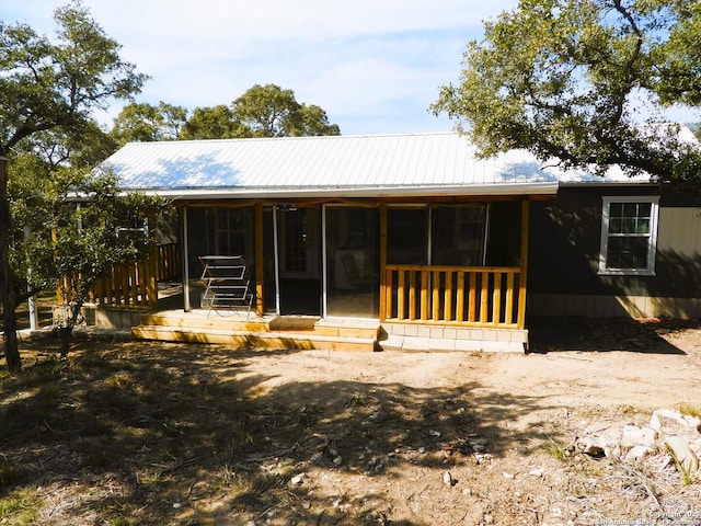 view of front of home with a wooden deck