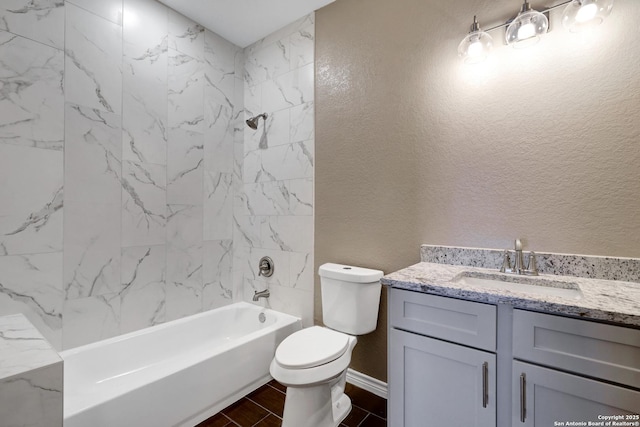 4423 Buena Vista St, San Antonio, TX 78237 - full bathroom featuring tiled shower / bath, vanity, and toilet