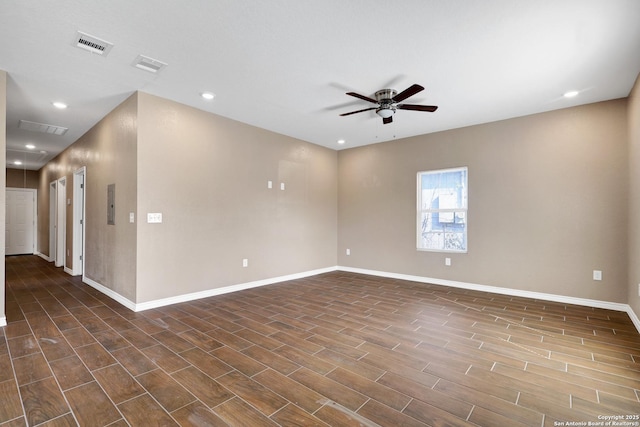 4423 Buena Vista St, San Antonio, TX 78237 - unfurnished room with dark hardwood / wood-style floors, electric panel, and ceiling fan