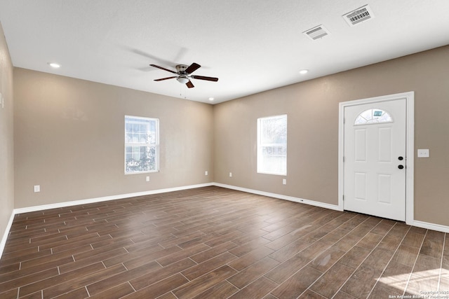 4423 Buena Vista St, San Antonio, TX 78237 - foyer entrance with ceiling fan and dark hardwood / wood-style floors