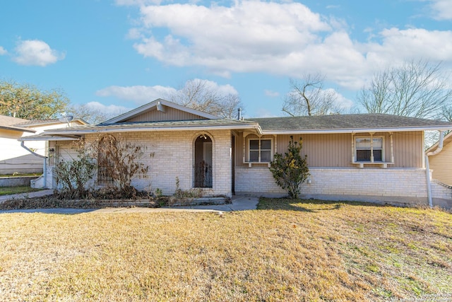 ranch-style house with a front lawn